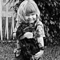 Little Girl With Puppy